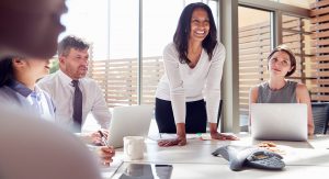 a group of people in a business meeting